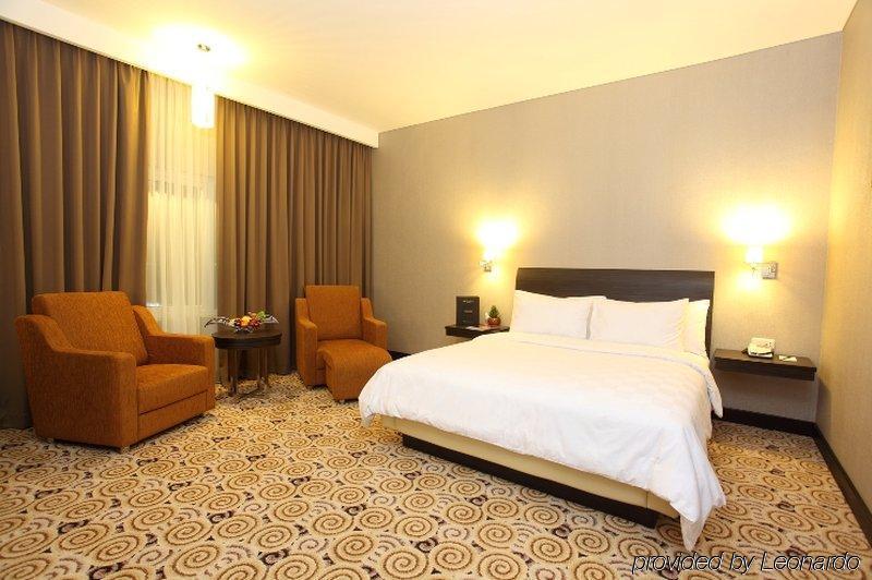 Swiss-Belhotel Kendari Værelse billede