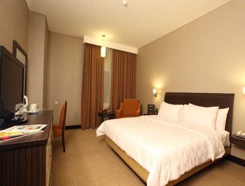Swiss-Belhotel Kendari Værelse billede